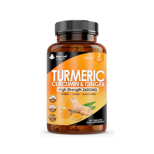 A bottle of New Leaf Turmeric Curcumin & Ginger 2600mg tablets with 180 tablets inside. The label is predominantly orange and white, with an image of a turmeric root and ginger root.
